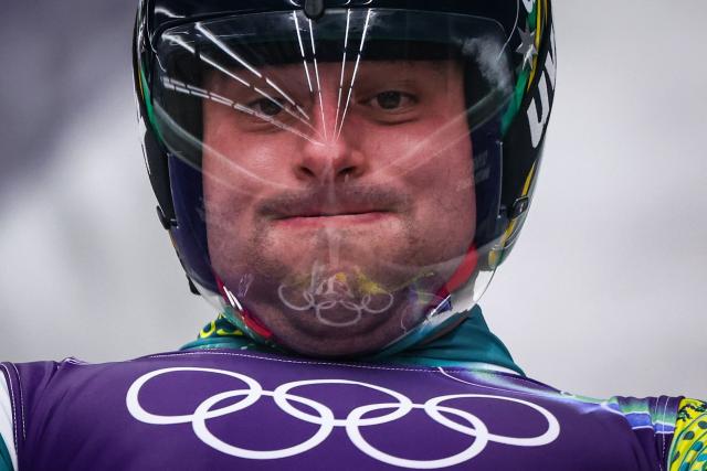 Australia's Alexander Ferlazzo competes in the luge men's singles run 1 at Cortina Sliding Centre during the Milano Cortina 2026 Winter Olympic Games in Cortina d'Ampezzo on February 7, 2026. (Photo by FRANCK FIFE / AFP)
