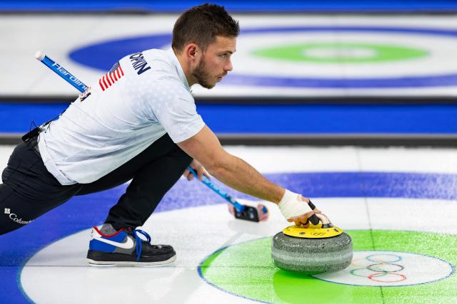 US' Korey Dropkin competes in the curling mixed doubles round robin between Britain and USA during the Milano Cortina 2026 Winter Olympic Games at the Cortina Curling Olympic Stadium in Cortina d’Ampezzo on February 7, 2026. (Photo by Odd ANDERSEN / AFP)