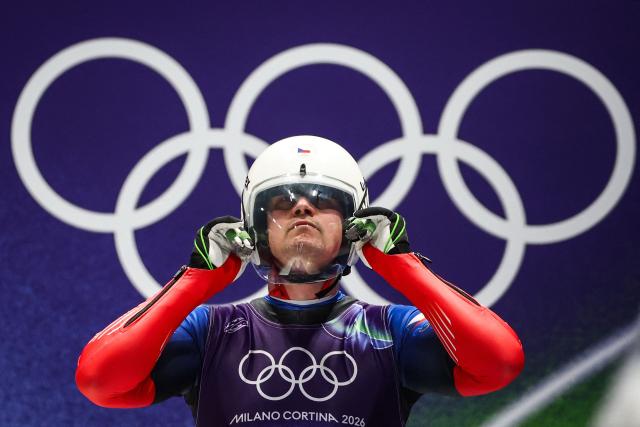 Czech Republic's Ondrej Hyman prepares to take the start in the luge men's singles run 1 at Cortina Sliding Centre during the Milano Cortina 2026 Winter Olympic Games in Cortina d'Ampezzo on February 7, 2026. (Photo by FRANCK FIFE / AFP)
