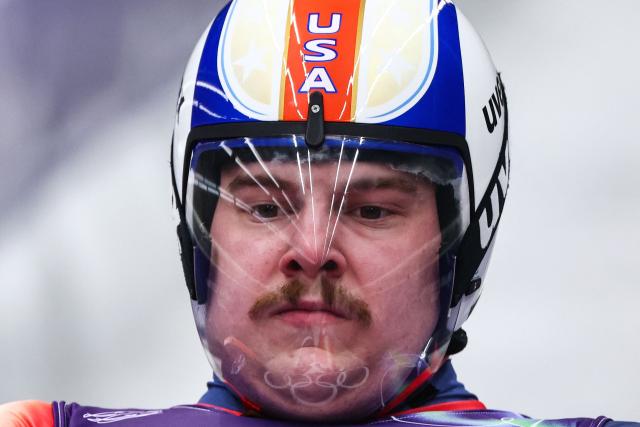 USA's Matthew Greinercompetes in the luge men's singles run 1 at Cortina Sliding Centre during the Milano Cortina 2026 Winter Olympic Games in Cortina d'Ampezzo on February 7, 2026. (Photo by FRANCK FIFE / AFP)