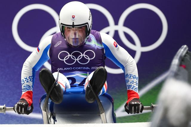 Slovakia's Jozef Ninis takes the start to compete in the luge men's singles run 1 at Cortina Sliding Centre during the Milano Cortina 2026 Winter Olympic Games in Cortina d'Ampezzo on February 7, 2026. (Photo by FRANCK FIFE / AFP)