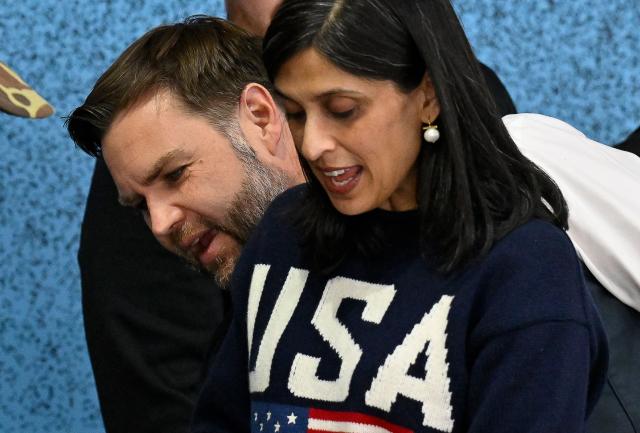 US Vice President  JD Vance and US Second Lady Usha Vance  attend  the women's preliminary round Group A Ice Hockey match between USA and Finland at the Milano Rho Ice Hockey Arena at the Milano Cortina 2026 Winter Olympic Games in Milan, on February 7, 2026. (Photo by Alexander NEMENOV / AFP)