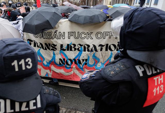 Supporters of German anti-fascist activist Maja T, who was sentenced to eight years in prison in Budapest, take part in a demonstration in support of her on February 7, 2026 in Jena, eastern Germany. The 25-year-old non-binary person was sentenced in Budapest to eight years in prison for an attack on right-wing extremists in February 2023 in Hungary. The trial was controversial because Maja T. had been extradited from Germany to Hungary, which is governed by a right-wing nationalist administration, despite an urgent appeal before the Federal Constitutional Court. (Photo by JENS SCHLUETER / AFP)