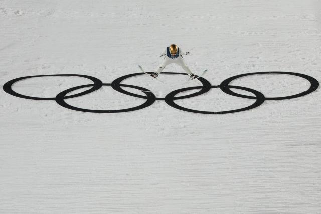 Norway's Anna Odine Stroem jumps during the women's ski jumping normal hill individual trial round of the Milano Cortina 2026 Winter Olympic Games at Predazzo Ski Jumping Stadium in Predazzo (Val di Fiemme), on February 7, 2026. (Photo by Anne-Christine POUJOULAT / AFP)