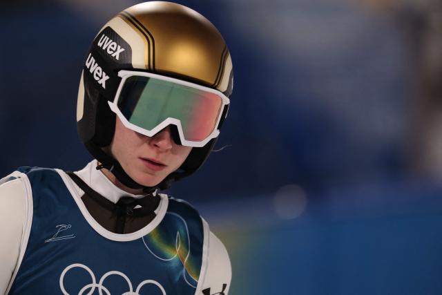 Slovenia's Nika Prevc reacts after a jump during the women's ski jumping normal hill individual trial round of the Milano Cortina 2026 Winter Olympic Games at Predazzo Ski Jumping Stadium in Predazzo (Val di Fiemme), on February 7, 2026. (Photo by Anne-Christine POUJOULAT / AFP)