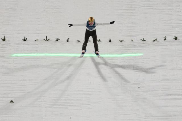 Slovenia's Nika Prevc lands after jumping during the women's ski jumping normal hill individual trial round of the Milano Cortina 2026 Winter Olympic Games at Predazzo Ski Jumping Stadium in Predazzo (Val di Fiemme), on February 7, 2026. (Photo by Anne-Christine POUJOULAT / AFP)