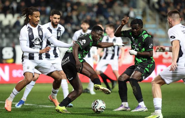 Royal Charleroi SC's French midfielder #05 Etienne Camara (L) and Cercle Brugge's Guinean defender #02 Ibrahim Diakite (C) fight for the ball during the Belgian "Pro League" First Division football match between Royal Charleroi SC and Cercle Brugge at Stade du Pays de Charleroi in Charleroi on February 7, 2026. (Photo by VIRGINIE LEFOUR / BELGA / AFP) / Belgium OUT