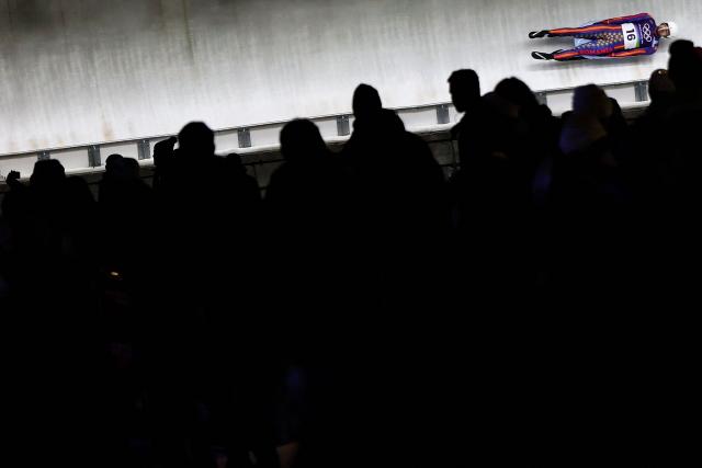 Romania's Eduard-Mihai Craciun competes in the luge men's singles run 2 at Cortina Sliding Centre during the Milano Cortina 2026 Winter Olympic Games in Cortina d'Ampezzo on February 7, 2026. (Photo by FRANCK FIFE / AFP)