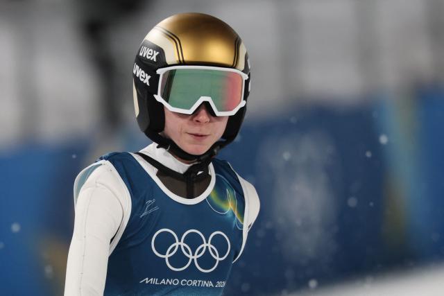 Slovenia's Nika Prevc reacts after a jump during the women's ski jumping normal hill individual 1st round of the Milano Cortina 2026 Winter Olympic Games at Predazzo Ski Jumping Stadium in Predazzo (Val di Fiemme), on February 7, 2026. (Photo by Anne-Christine POUJOULAT / AFP)