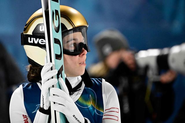 Austria's Lisa Eder reacts after a jump during the women's ski jumping normal hill individual 1st round of the Milano Cortina 2026 Winter Olympic Games at Predazzo Ski Jumping Stadium in Predazzo (Val di Fiemme), on February 7, 2026. (Photo by Tobias SCHWARZ / AFP)