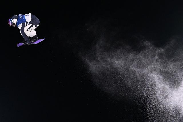 Japan's Taiga Hasegawa competes in the snowboard men's big air final run 1 during the Milano Cortina 2026 Winter Olympic Games at Livigno Snow Park, in Livigno (Valtellina), on February 7, 2026. (Photo by Kirill KUDRYAVTSEV / AFP)