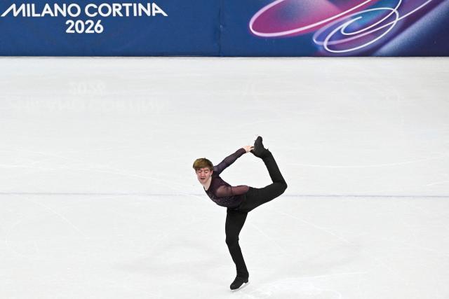 Britain's Edward Appleby competes in the figure skating team event men's singles short program during the Milano Cortina 2026 Winter Olympic Games at Milano Ice Skating Arena in Milan on February 7, 2026. (Photo by JULIEN DE ROSA / AFP)