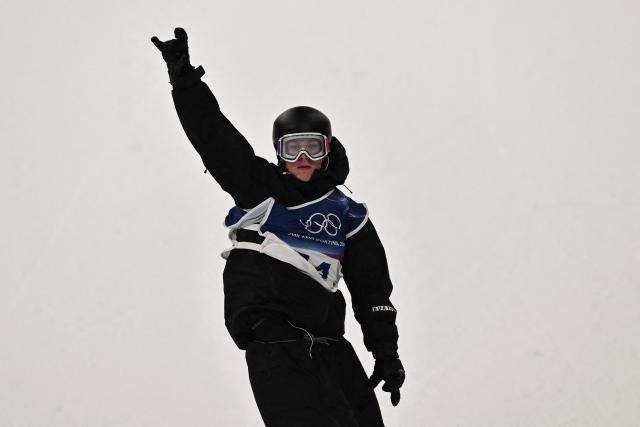 New Zealand's Rocco Jamieson reacts in the snowboard men's big air final run 2 during the Milano Cortina 2026 Winter Olympic Games at Livigno Snow Park, in Livigno (Valtellina), on February 7, 2026. (Photo by Jeff PACHOUD / AFP)