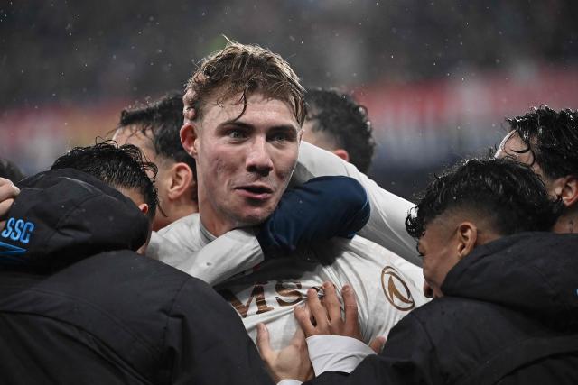 Napoli's Danish forward #19 Rasmus Hojlund celebrates after scoring a penalty during the Italian Serie A football match between Genoa and Napoli at the Luigi Ferraris stadium in Genoa on February 7, 2026. (Photo by Isabella BONOTTO / AFP)