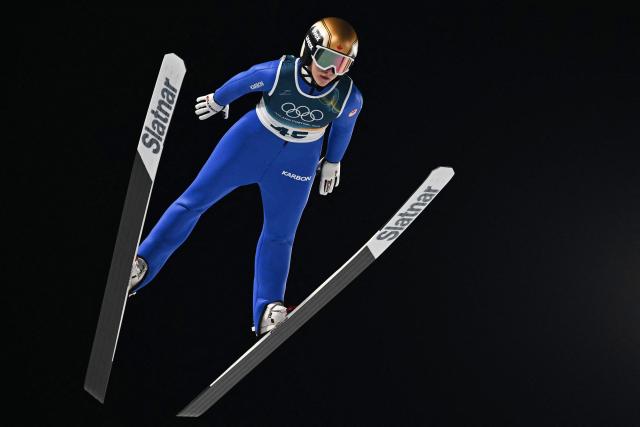 Canada's Abigail Strate jumps during the women's ski jumping normal hill individual final round of the Milano Cortina 2026 Winter Olympic Games at Predazzo Ski Jumping Stadium in Predazzo (Val di Fiemme), on February 7, 2026. (Photo by Javier SORIANO / AFP)