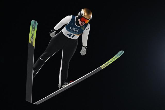 Slovenia's Nika Vodan jumps during the women's ski jumping normal hill individual final round of the Milano Cortina 2026 Winter Olympic Games at Predazzo Ski Jumping Stadium in Predazzo (Val di Fiemme), on February 7, 2026. (Photo by Javier SORIANO / AFP)