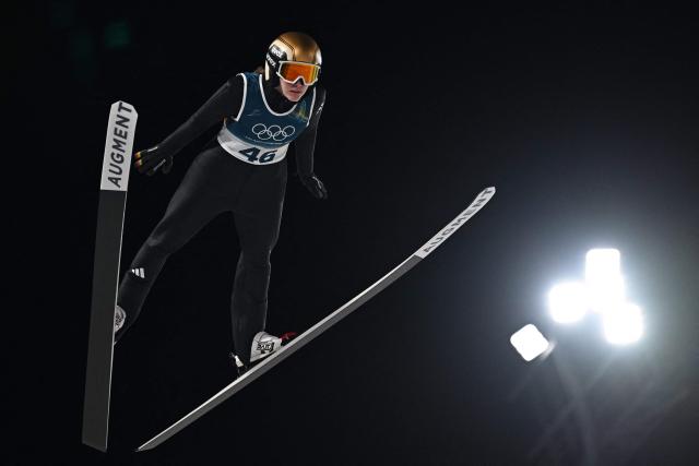 Germany's Selina Freitag jumps during the women's ski jumping normal hill individual final round of the Milano Cortina 2026 Winter Olympic Games at Predazzo Ski Jumping Stadium in Predazzo (Val di Fiemme), on February 7, 2026. (Photo by Javier SORIANO / AFP)