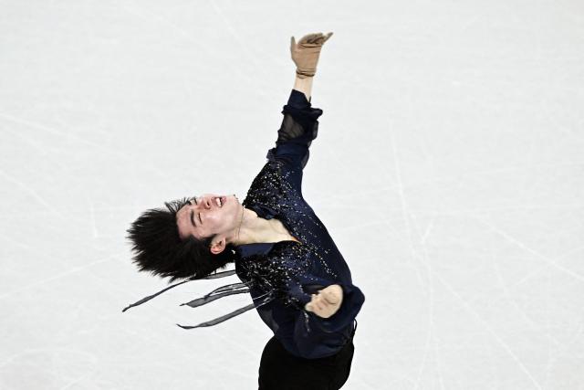 South Korea's Cha Junhwan competes in the figure skating team event men's singles short program during the Milano Cortina 2026 Winter Olympic Games at Milano Ice Skating Arena in Milan on February 7, 2026. (Photo by JULIEN DE ROSA / AFP)