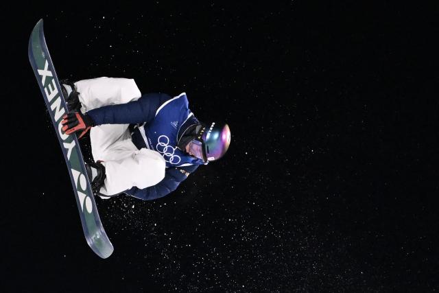 Japan's Kira Kimura competes in the snowboard men's big air final run 3 during the Milano Cortina 2026 Winter Olympic Games at Livigno Snow Park, in Livigno (Valtellina), on February 7, 2026. (Photo by Kirill KUDRYAVTSEV / AFP)