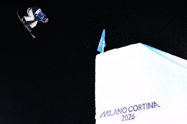 Japan's Kira Kimura competes in the snowboard men's big air final run 3 during the Milano Cortina 2026 Winter Olympic Games at Livigno Snow Park, in Livigno (Valtellina), on February 7, 2026. (Photo by Kirill KUDRYAVTSEV / AFP)
