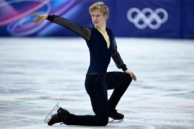 Italy's Daniel Grassl competes in the figure skating team event men's singles short program during the Milano Cortina 2026 Winter Olympic Games at Milano Ice Skating Arena in Milan on February 7, 2026. (Photo by WANG Zhao / AFP)