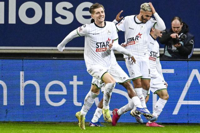 OH Leuven's French-Moroccan midfielder #10 Youssef Maziz (2R) celebrates with teammates after scoring Leuven's third goal during the Belgian "Pro League" First Division football match between KAA Gent and Oud-Heverlee Leuven at the KAA Stadium in Ghent on February 7, 2026. (Photo by Tom Goyvaerts / Belga / AFP) / Belgium OUT