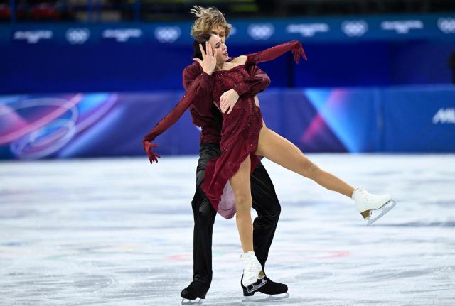 Georgia's Diana Davis (L) and Georgia's Gleb Smolkin compete in the figure skating team event ice dance-free dance during the Milano Cortina 2026 Winter Olympic Games at Milano Ice Skating Arena in Milan on February 7, 2026. (Photo by WANG Zhao / AFP)