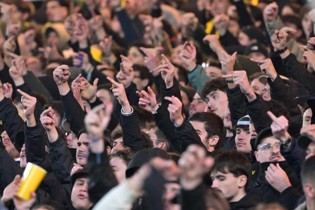 Nantes’ supporters gesture from the stands against Nantes owner Waldemar Kita (not pictured) at the end of the French L1 football match between FC Nantes and Olympique Lyonnais (OL) at the Stade de la Beaujoire–Louis Fonteneau in Nantes, western France, on February 7, 2026. (Photo by Damien Meyer / AFP)