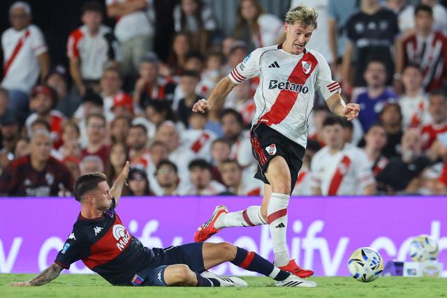 Tigre's midfielder #11 Tiago Serrago (L) and River Plate's forward #11 Facundo Colidio (R) fight for the ball during the Argentine Professional Football League 2026 Apertura Tournament match between River Plate and Tigre at the Mas Monumental Stadium in Buenos Aires on February 7, 2026. (Photo by Alejandro PAGNI / AFP)