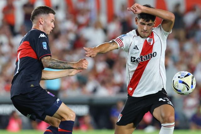 Tigre's midfielder #11 Tiago Serrago (L) and River Plate's defender #13 Lautaro Rivero (R) fight for the ball during the Argentine Professional Football League 2026 Apertura Tournament match between River Plate and Tigre at the Mas Monumental Stadium in Buenos Aires on February 7, 2026. (Photo by Alejandro PAGNI / AFP)