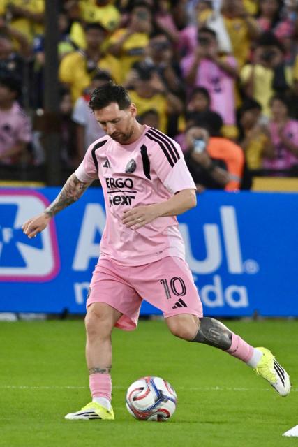 Inter Miami's Argentine forward #10 Lionel Messi warms up ahead of the friendly football match between Ecuador's Barcelona and the US' Inter Miami at the Banco Pichincha Stadium in Guayaquil, Ecuador, on February 7, 2026. (Photo by Marcos PIN / AFP)