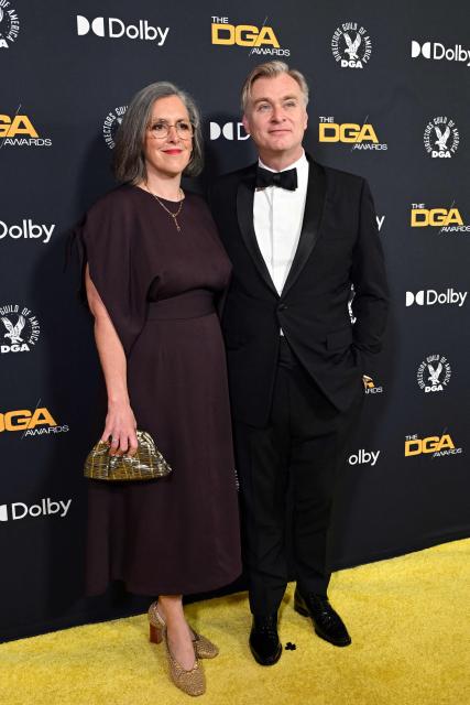 British-US filmmaker Christopher Nolan (R) and his wife British producer Emma Thomas attend the 78th Annual DGA (Directors Guild of America) awards at the Beverly Hilton hotel in Beverly Hills, California on February 7, 2026. (Photo by Lisa O'CONNOR / AFP)
