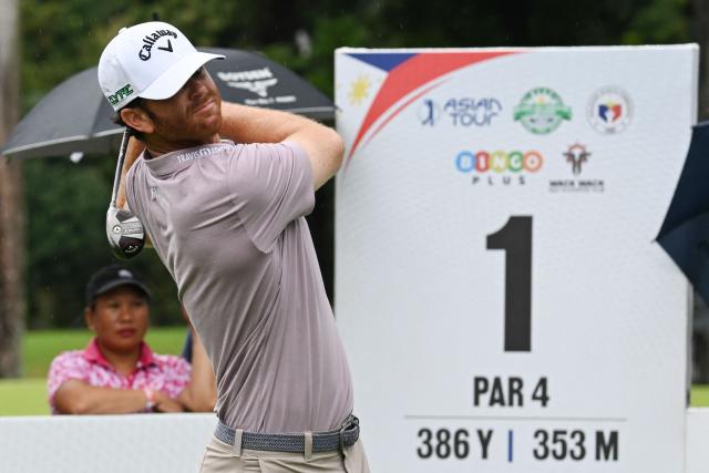 USA's Marcus Plunkett tees off during the final round of the Philippines Golf Championship tournament at Wack Wack Golf and Country Club in Manila on February 8, 2026. (Photo by Ted ALJIBE / AFP)