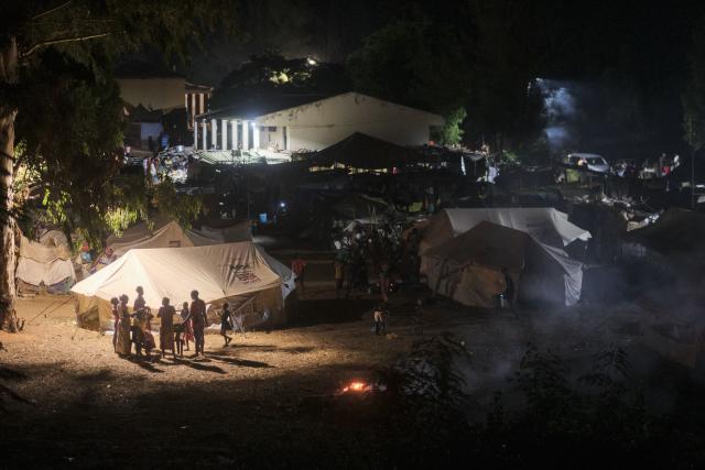 Displaced persons gather at a school serving as a camp for internally displaced persons on February 7, 2026 in Xai-Xai, Gaza province, Mozambique. The latest flooding is among the worst Mozambique has seen in years, with officials warning the death toll could rise as more heavy rains loom and a nationwide red?alert remains in force. Across the region, floods have ripped through critical infrastructure -- roads, bridges, power lines and water systems. They have slowed aid deliveries and isolated entire communities. 
The N1 highway linking Maputo to the north remains cut. About 325,000 head of livestock have died and 285,000 hectares (704,250 acres) of farmland have been damaged, according to OCHA. (Photo by Zinyange Auntony / AFP)