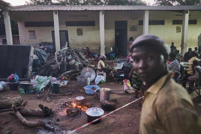 Displaced persons gather at a school serving as a camp for internally displaced persons on February 7, 2026 in Xai-Xai, Gaza province, Mozambique. The latest flooding is among the worst Mozambique has seen in years, with officials warning the death toll could rise as more heavy rains loom and a nationwide red?alert remains in force. Across the region, floods have ripped through critical infrastructure -- roads, bridges, power lines and water systems. They have slowed aid deliveries and isolated entire communities. 
The N1 highway linking Maputo to the north remains cut. About 325,000 head of livestock have died and 285,000 hectares (704,250 acres) of farmland have been damaged, according to OCHA. (Photo by Zinyange Auntony / AFP)