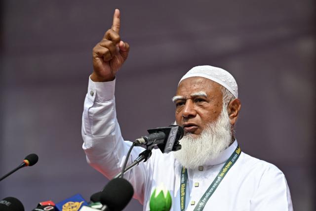 Shafiqur Rahman, Jamaat-e-Islami party leader speaks during a Jamaat-led alliance rally ahead of Bangladesh's general election in Dhaka on February 8, 2026. (Photo by Sajjad HUSSAIN / AFP)