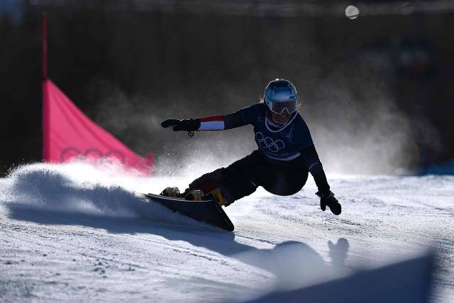 Austria's Claudia Riegler competes in the snowboard women's parallel giant Slalom elimination run at Livigno Snow Park during the Milano Cortina 2026 Winter Olympic Games, in Livigno (Valtellina), on February 8, 2026. (Photo by Kirill KUDRYAVTSEV / AFP)