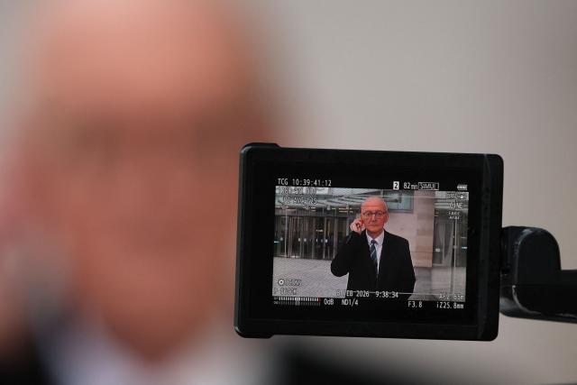 Britain's Pensions Secretary Pat McFadden is seen on the screen of a TV camera as he gives an interview outside the BBC building in central London on February 8, 2026, after an appearance on the BBC's 'Sunday' political television show. (Photo by Adrian Dennis / AFP)