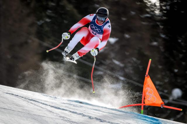 Switzerland's Franjo von Allmen competes in the men's downhill alpine skiing event during the Milano Cortina 2026 Winter Olympic Games at the Stelvio Ski Centre in Bormio (Valtellina) on February 7, 2026. (Photo by Fabrice COFFRINI / AFP)