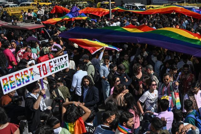 Activists and supporters of the LGBTQ community attends the Delhi Queer Pride parade in New Delhi on February 8, 2026. (Photo by Arun SANKAR / AFP)