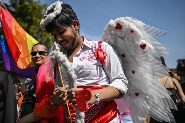 Activists and supporters of the LGBTQ community attends the Delhi Queer Pride parade in New Delhi on February 8, 2026. (Photo by Arun SANKAR / AFP)