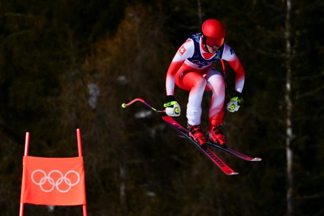 Switzerland's Malorie Blanc competes in the women's downhill event during the Milano Cortina 2026 Winter Olympic Games at the Tofane Alpine Skiing Centre in Cortina d’Ampezzo on February 8, 2026. (Photo by Stefano RELLANDINI / AFP)