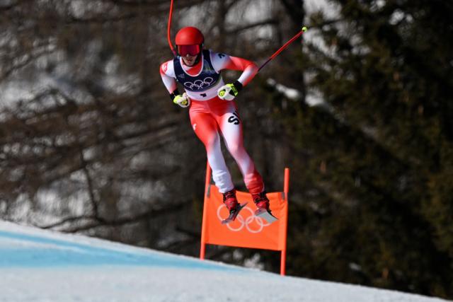Switzerland's Malorie Blanc competes in the women's downhill event during the Milano Cortina 2026 Winter Olympic Games at the Tofane Alpine Skiing Centre in Cortina d’Ampezzo on February 8, 2026. (Photo by Franзois-Xavier MARIT / AFP)