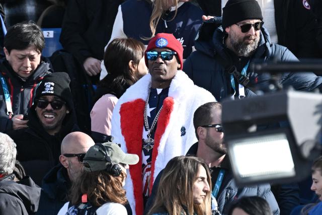 US rapper Snoop Dogg attends the women's downhill event during the Milano Cortina 2026 Winter Olympic Games at the Tofane Alpine Skiing Centre in Cortina d’Ampezzo on February 8, 2026. (Photo by Tiziana FABI / AFP)