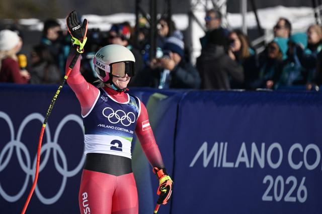 Austria's Ariane Raedler reacts in the finish area after competing in the women's downhill event during the Milano Cortina 2026 Winter Olympic Games at the Tofane Alpine Skiing Centre in Cortina d’Ampezzo on February 8, 2026. (Photo by Tiziana FABI / AFP)