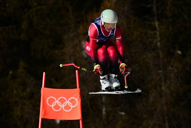 Austria's Ariane Raedler competes in the women's downhill event during the Milano Cortina 2026 Winter Olympic Games at the Tofane Alpine Skiing Centre in Cortina d’Ampezzo on February 8, 2026. (Photo by Stefano RELLANDINI / AFP)