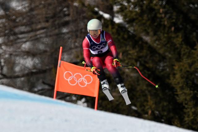 Austria's Ariane Raedler competes in the women's downhill event during the Milano Cortina 2026 Winter Olympic Games at the Tofane Alpine Skiing Centre in Cortina d’Ampezzo on February 8, 2026. (Photo by Franзois-Xavier MARIT / AFP)