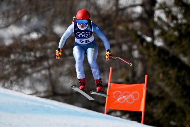 Bosnia-Herzegovina's Elvedina Muzaferija competes in the women's downhill event during the Milano Cortina 2026 Winter Olympic Games at the Tofane Alpine Skiing Centre in Cortina d’Ampezzo on February 8, 2026. (Photo by Franзois-Xavier MARIT / AFP)