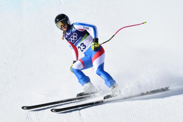 France's Laura Gauche reacts in the finish area of the women's downhill event during the Milano Cortina 2026 Winter Olympic Games at the Tofane Alpine Skiing Centre in Cortina d’Ampezzo on February 8, 2026. (Photo by Marco BERTORELLO / AFP)
