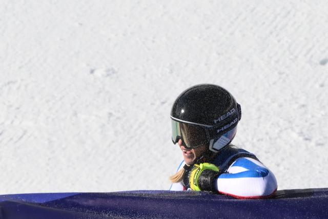 France's Laura Gauche reacts in the finish area of the women's downhill event during the Milano Cortina 2026 Winter Olympic Games at the Tofane Alpine Skiing Centre in Cortina d’Ampezzo on February 8, 2026. (Photo by Marco BERTORELLO / AFP)